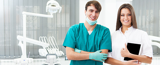 Dentist and female asistent